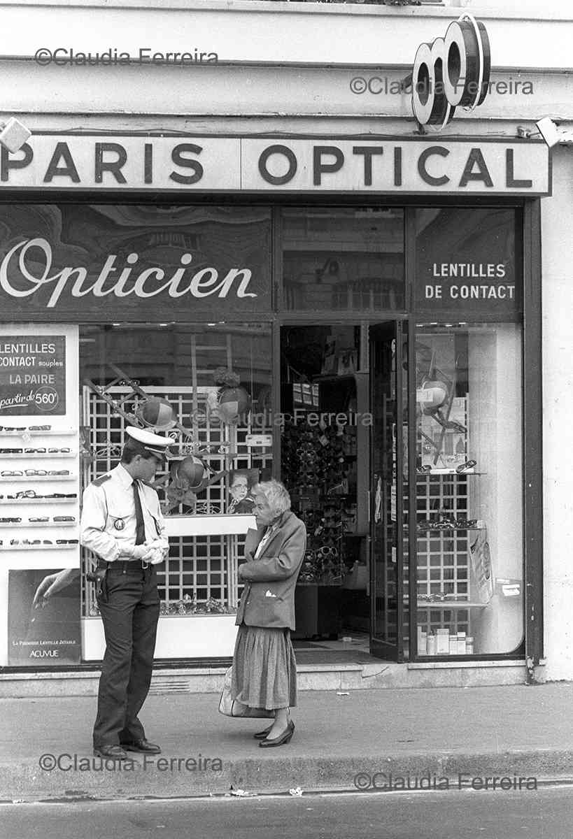 Police Officer & Woman Talk On Quai Saint-Michel